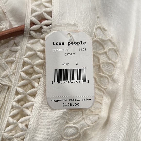 Free People White Cut Out, beautiful detailed Mini Dress. Size 2 V-Neck Neckline - Picture 8 of 8